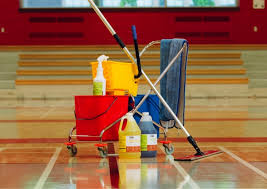 Professional sports flooring maintenance in a modern indoor gym