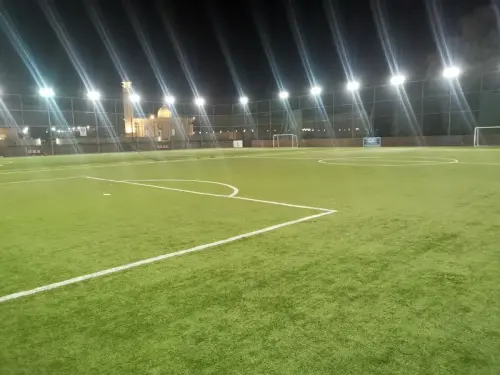 Football field construction UAE with artificial turf installation