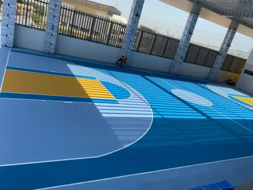 Close-up texture of acrylic sports flooring surface with anti-slip coating